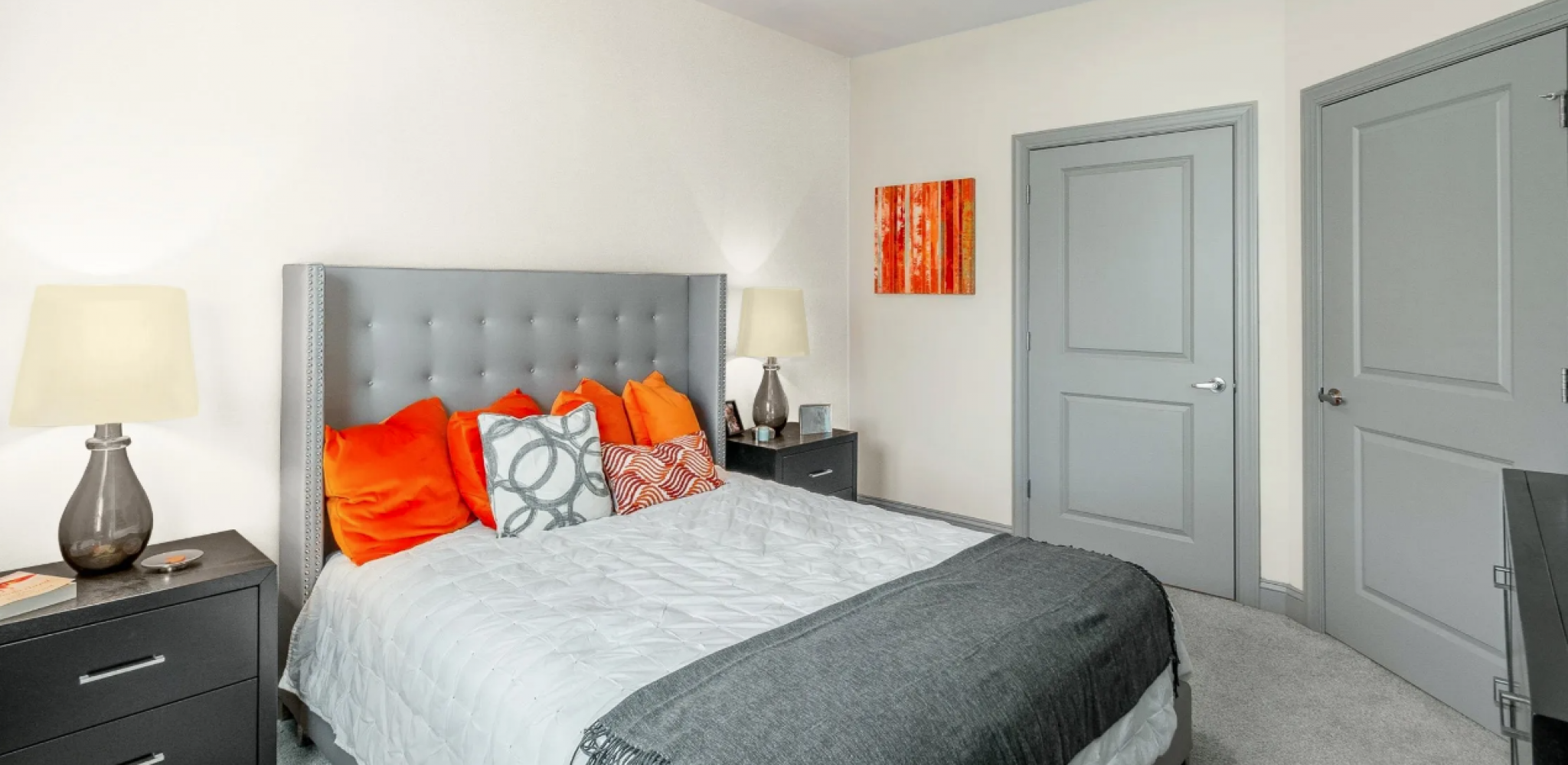 Hawthorne at the Summit spacious apartment bedroom with bedside tables and carpet