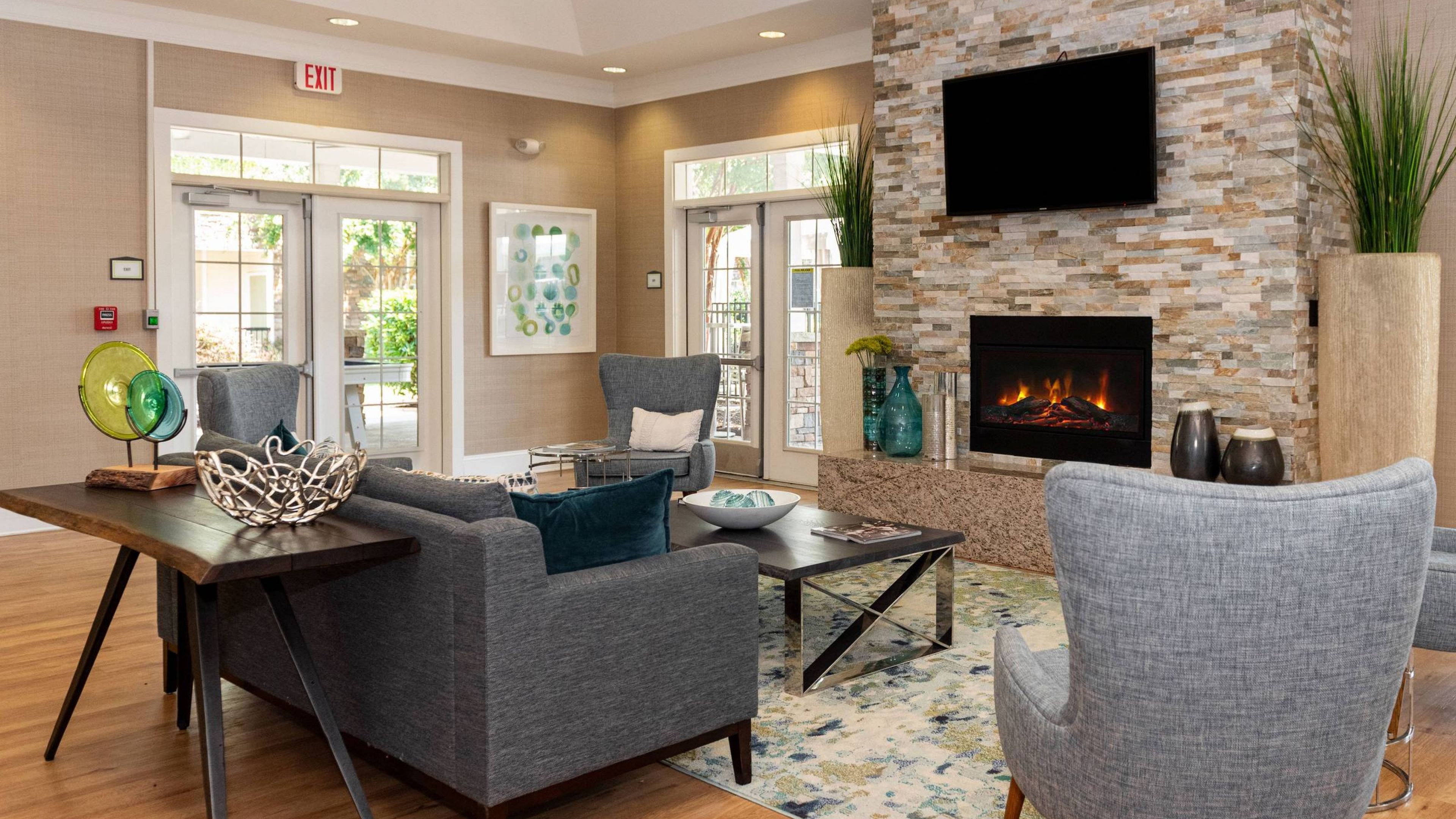 Hawthorne at the Summit resident clubhouse amenity with seating area and beautiful finishes