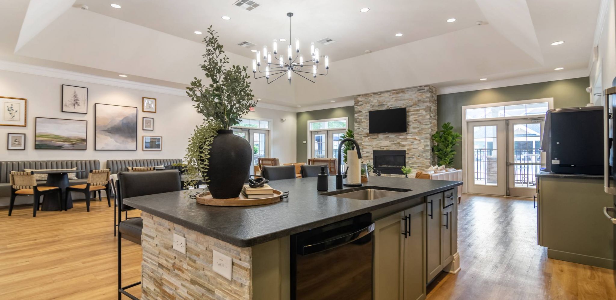 Hawthorne at the Summit resident clubhouse amenity with kitchen seating area and beautiful finishes
